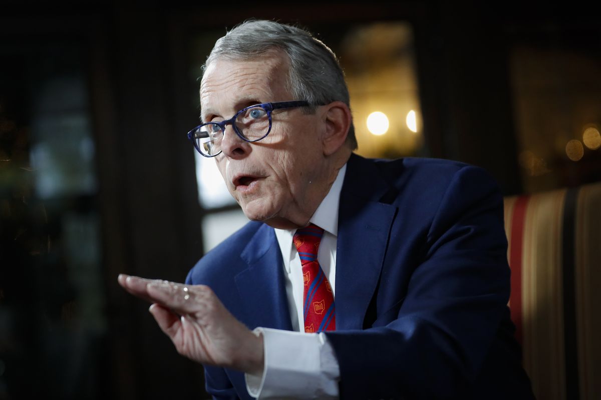 FILE - In this Dec. 13, 2019, file photo, Ohio Gov. Mike DeWine speaks during an interview at the Governor