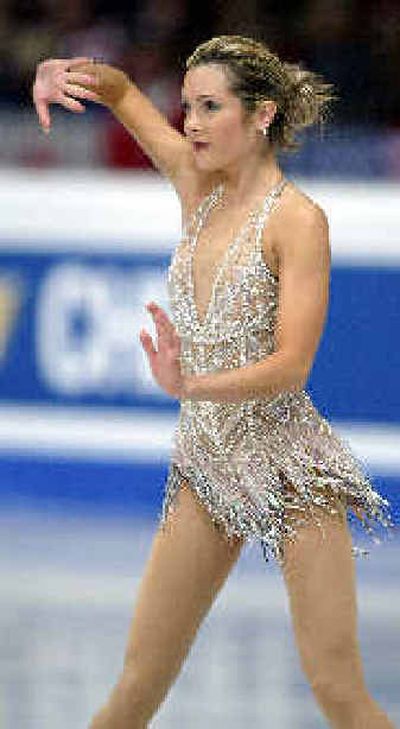 
Jennifer Kirk, performing at the World Figure Skating Championships in Germany in March, has her sights set on Portland in January 2005.Jennifer Kirk, performing at the World Figure Skating Championships in Germany in March, has her sights set on Portland in January 2005.
 (Associated PressAssociated Press / The Spokesman-Review)