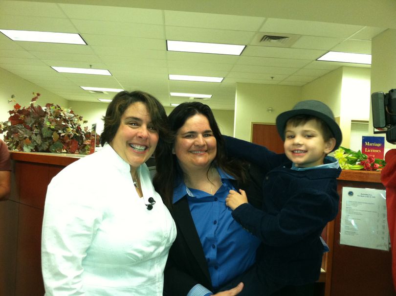 Shelia Robertson and Andrea Altmayer with son Bridger, at the Ada County Courthouse on Wednesday morning for a marriage license (Betsy Russell)