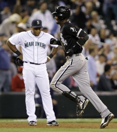 Chicago’s Alexei Ramirez rounds the bases after hitting a three-run homer in the ninth. (Associated Press / The Spokesman-Review)