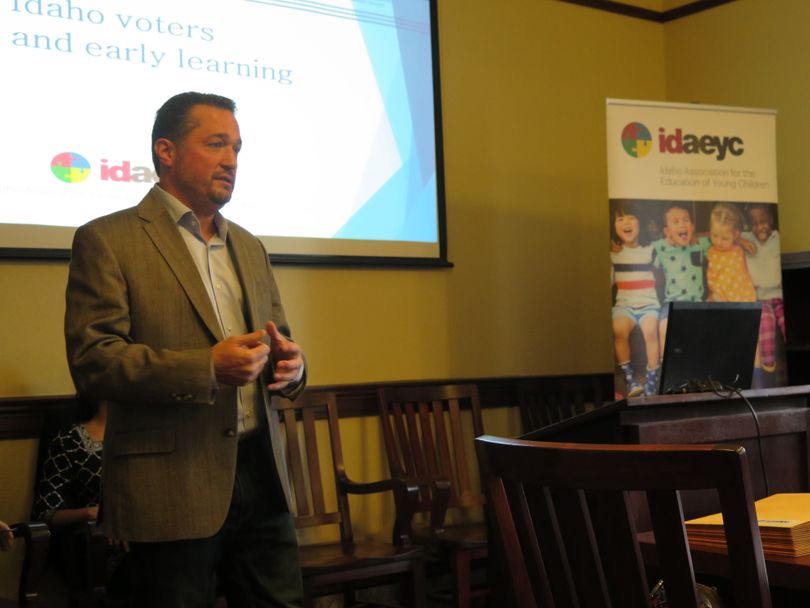 Erik Iverson, president and CEO of Moore Information, presents the results of a statewide poll of Idahoans that found strong support for state investment into pre-K programs for Idaho youngsters, during a news conference at the Idaho state Capitl on Wednesday, Jan. 10, 2018. (Betsy Z. Russell)