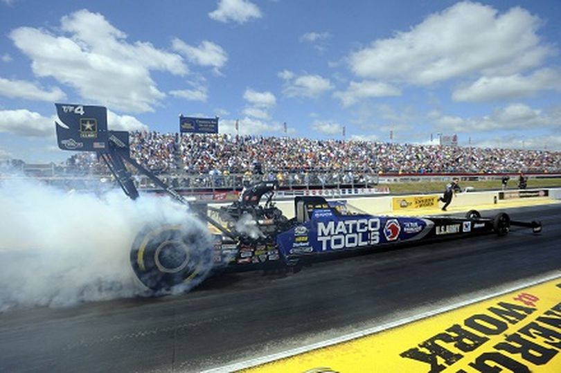 Antron Brown en route to his NHRA Full Throttle Drag Racing Series Top Fuel win in Atlanta. (Photo courtesy of NHRA)