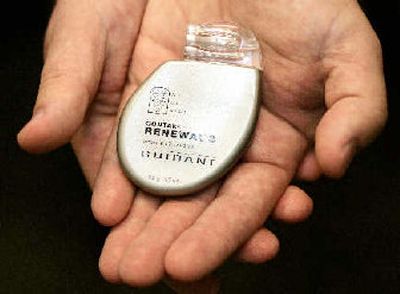 
 A Guidant Contak Renewal 3 defibrillator is shown in a file photo. The Federal Trade Commission on Wednesday cleared the way for Johnson & Johnson to acquire the struggling medical device maker Guidant Corp. in a $25.4 billion deal, but said the companies will have to spin off several product lines.
 (Associated Press / The Spokesman-Review)