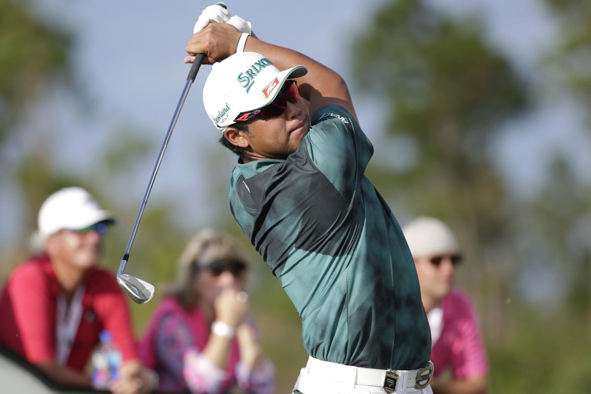 Hideki Matsuyama, of Japan, watches his shot from the 12th tee during the third round at the Hero World Challenge golf tournament, Saturday, Dec. 3, 2016, in Nassau, Bahamas. (Lynne Sladky / Associated Press)