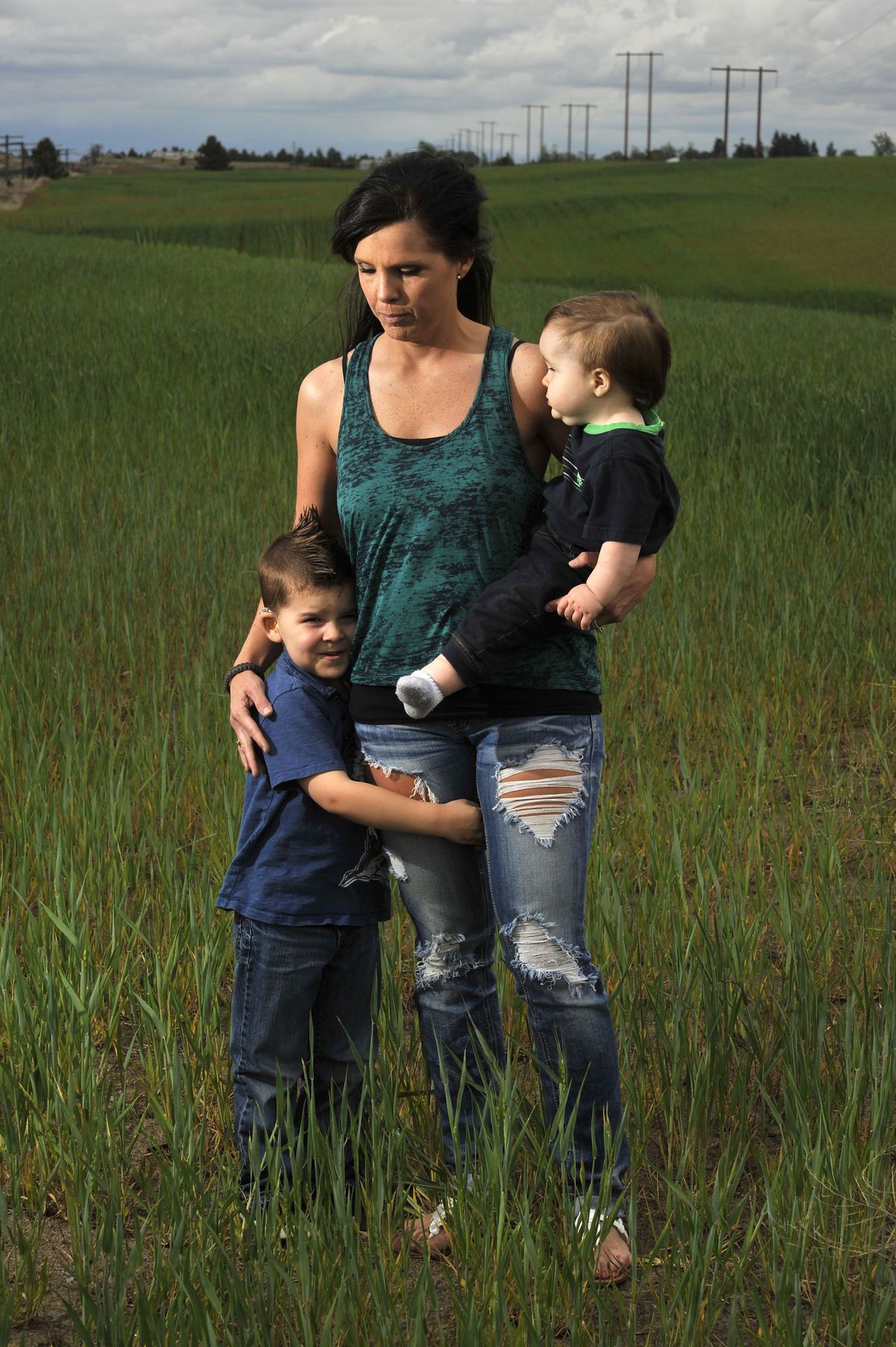 Crystal Scott, pictured with her sons Aedan, 4, and Roman, 1, has been at the center of a controversy after two airmen at Fairchild Air Force Base posed for photos of them breast-feeding in uniform. (Colin Mulvany)