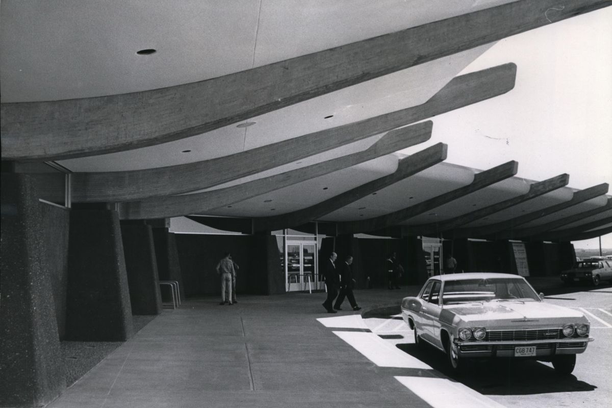 1965: Architects Warren Heylman and William Trogdon designed the Spokane International Airport terminal building with a futuristic flair that included swooping concrete beams over the ticketing area. Unseen is a giant rotunda building to welcome planes. It opened in May  1965 and has been added on to many times, including new concourses to accommodate many more airplanes at a time than the original design. (The Spokesman-Review photo archive / SR)