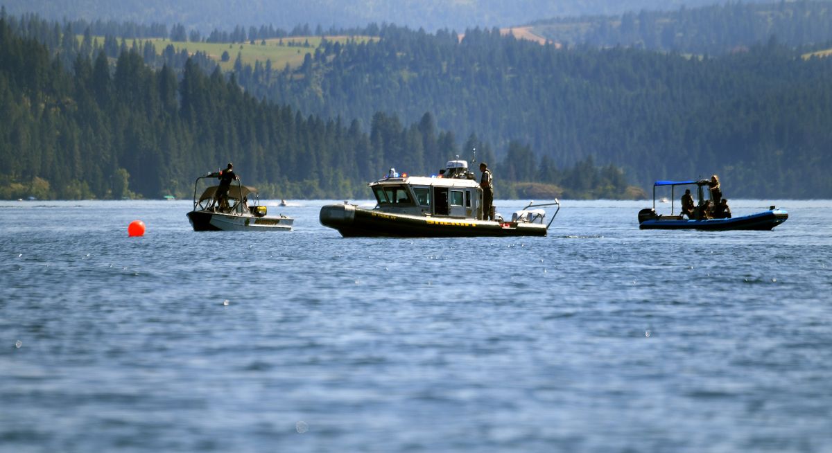 The recovery effort is underway on Lake Coeur d’Alene on Monday, near the scene of an airplane crash that happened on Sunday.  (Kathy Plonka/The Spokesman-Revie)