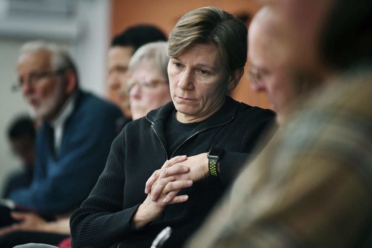 Asheville Police Chief Tammy Hooper listens to community members as they speak during the Asheville Citizens Police Action Committee meeting March 7, 2018 at the Dr. Wesley Grant Sr. Southside Center in Asheville, N.C. The FBI is probing the Aug. 25, 2017 beating of a black man by a white police officer as anger mounts about the handling of the case. (Angela Wilhelm / Associated Press)