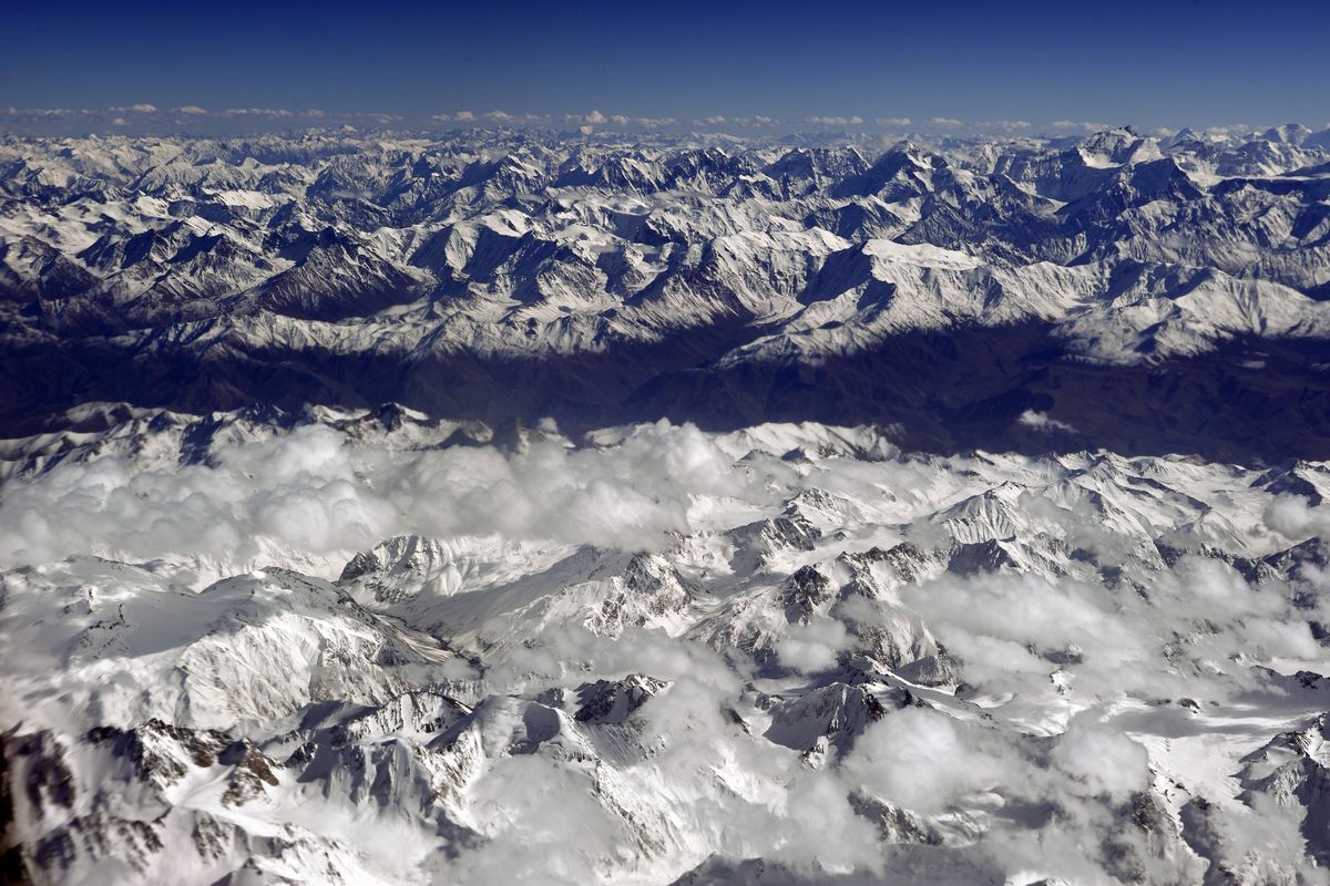  A KC-135R Stratotanker with the Fairchild Air Force Base 92nd Air Refueling Wing, on deployment at the Manas Transit Center in Kyrgyzstan, passes over Afghanistan’s snow-capped mountain ranges on Saturday. 
