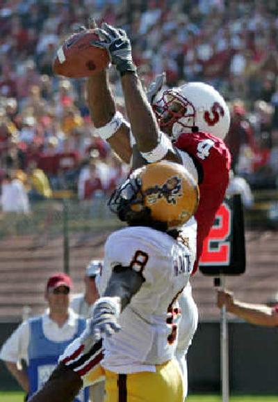
Stanford's Mark Bradford catches a pass over Arizona State's Keno Walter-White in the first quarter. 
 (Associated Press / The Spokesman-Review)