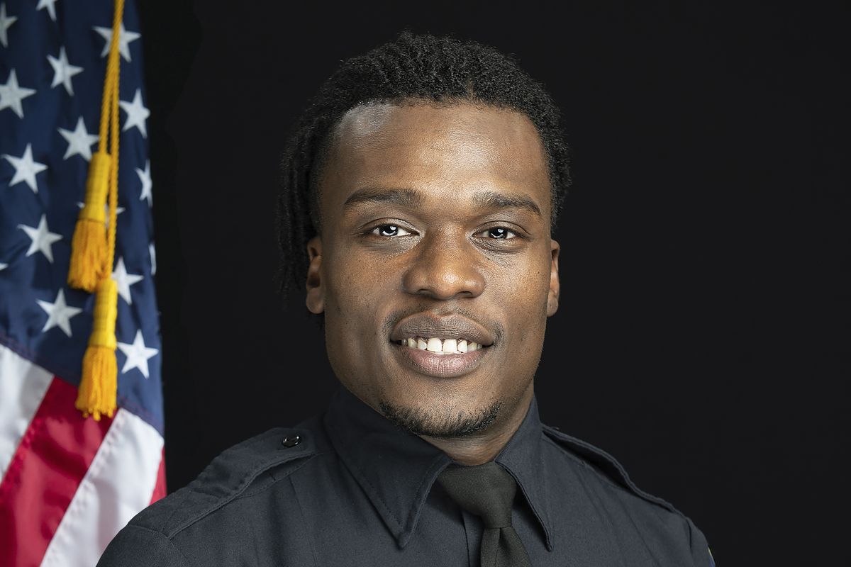 This undated file photo provided by the Wauwatosa Police Department in Wauwatosa, Wis., shows Wauwatosa Police Officer Joseph Mensah. In a report released Wednesday Oct. 7, 2020, an independent investigator recommended officials in the Milwaukee suburb fire Mensah, who has shot and killed three people in the last five years.  (Gary Monreal/Monreal Photography LLC)