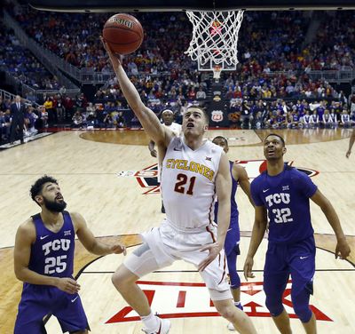 Iowa State's Matt Thomas (21) gets past TCU's Alex Robinson (25) to put up a shot during the second half of an NCAA college basketball game in the semifinal of the Big 12 tournament in Kansas City, Mo., Friday, March 10, 2017. Iowa State won 84-63. (Charlie Riedel / Associated Press)