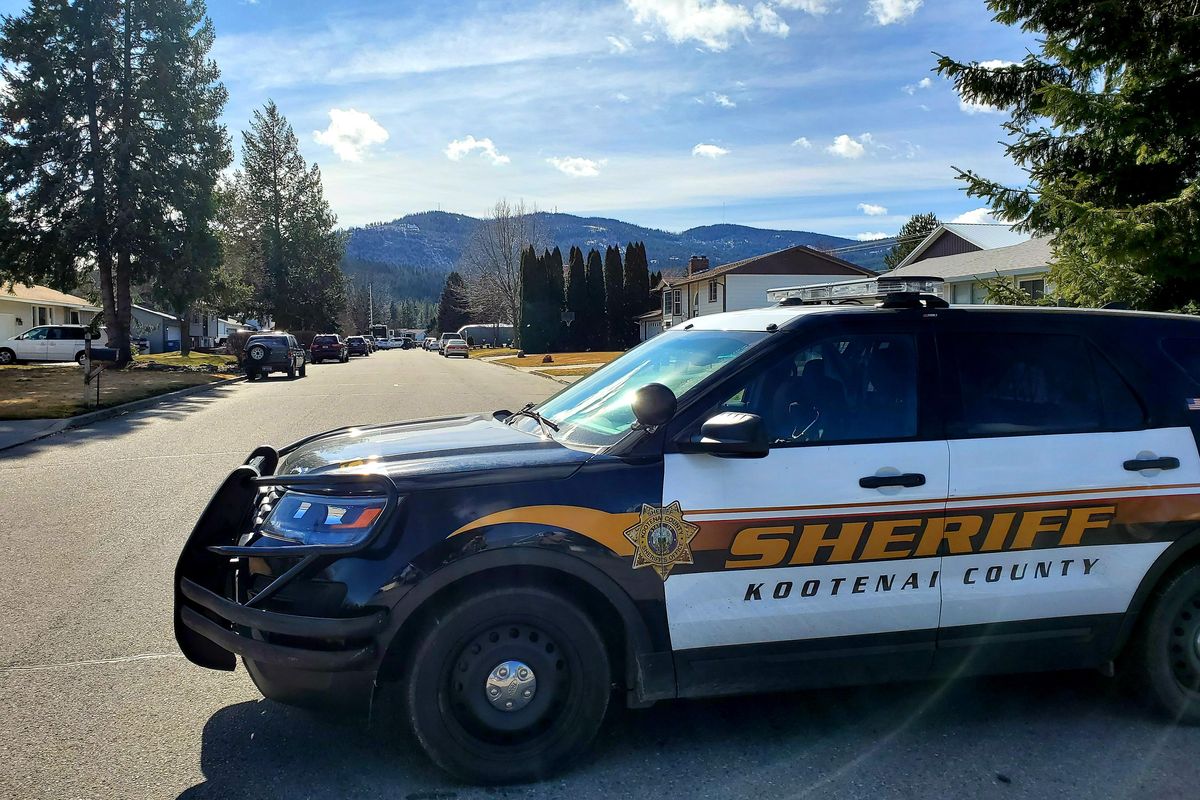 A Kootenai County Sheriff’s Office patrol vehicle blocks the 100 block of South Bentley Place in Post Falls on Wednesday, March 4, 2020, where a police sergeant was shot and a  man died inside a house the previous night. (Chad Sokol / The Spokesman-Review)