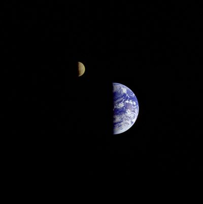 This image of the Earth and moon was taken by the Galileo spacecraft in 1992 from a distance of about 3.9 million miles. It illustrates how half of the Earth experiences daylight while the other half is in darkness.  (NASA)