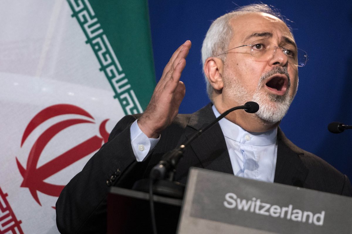 Iranian Foreign Minister Javad Zarif gestures as he speaks during a press conference, in Lausanne on Thursday. (Associated Press)