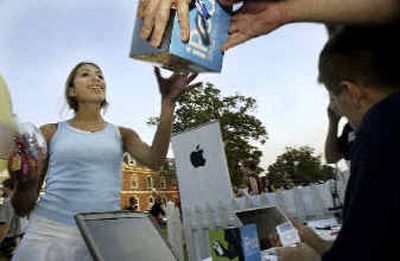 
Freshmen arriving for fall semester at Duke are being handed brand-new Apple iPods, engraved with the Duke crest and the words 