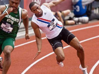 Tyson Gay falls during the first quarterfinal heat of the men's 200-meter race Saturday at the U.S. Olympic track and field trials in Eugene, Ore. Associated Press
 (Associated Press / The Spokesman-Review)