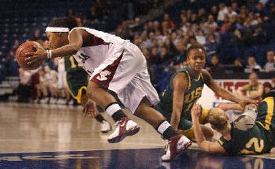 
Santa Clara guard Tracy Walker steals the ball in the second half. 
 (Brian Plonka / The Spokesman-Review)