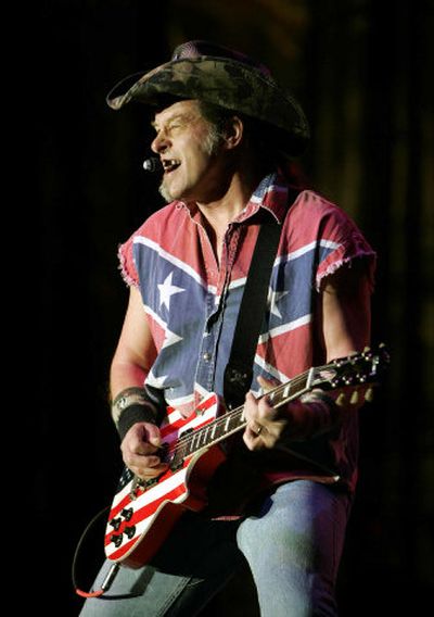 
Ted Nugent performs at Gov. Rick Perry's inaugural ball in Austin, Texas,  on Jan. 16. 
 (Associated Press / The Spokesman-Review)