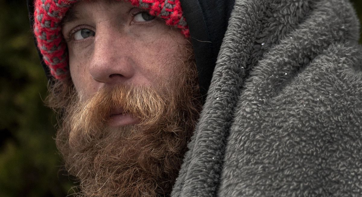 “They make people bow down to shower because they’re too short,” said Jonathan Winters about the height of the showers at House of Charity during an interview in Spokane on Wednesday, Nov. 7, 2018. Jonathan is originally from Oregon and is now homeless and living in Spokane. (Kathy Plonka / The Spokesman-Review)