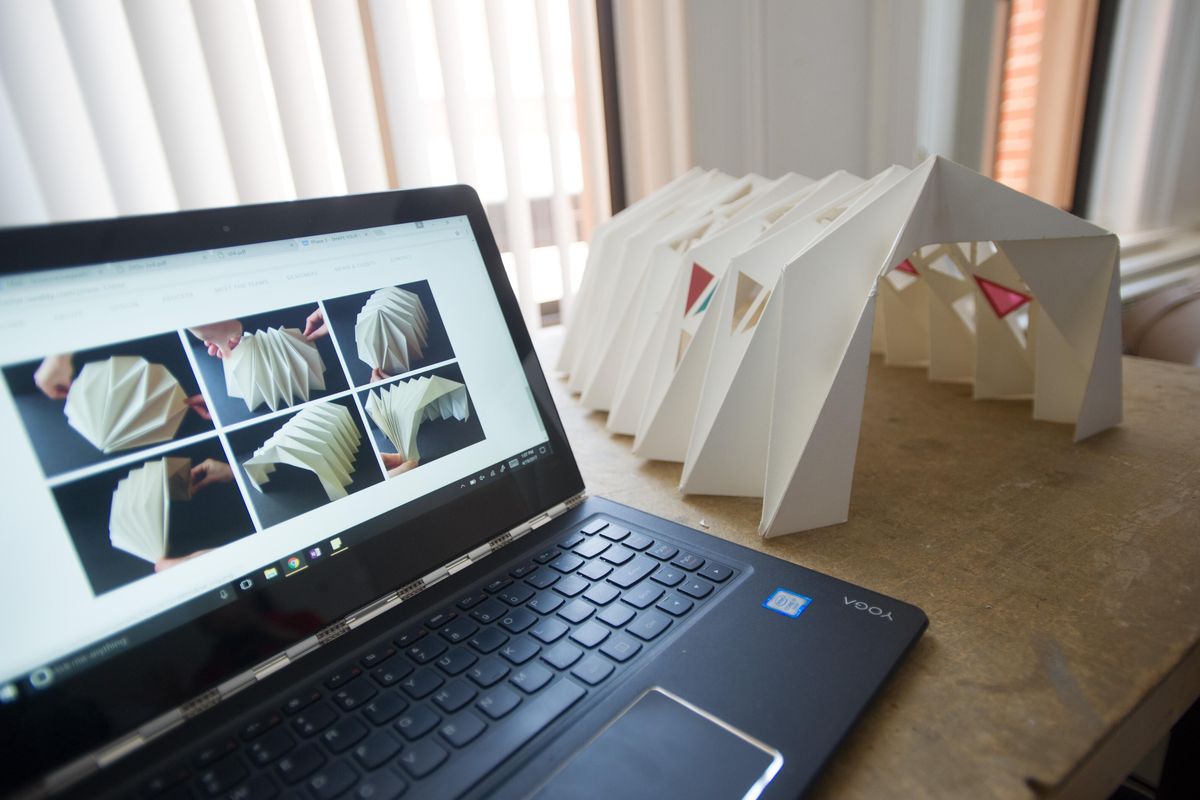 The various configurations of a portable homeless shelter designed by WSU architecture students can be seen next a model of the structure on Wednesday, April 19, 2017, in Pullman, Wash. (Tyler Tjomsland / The Spokesman-Review)