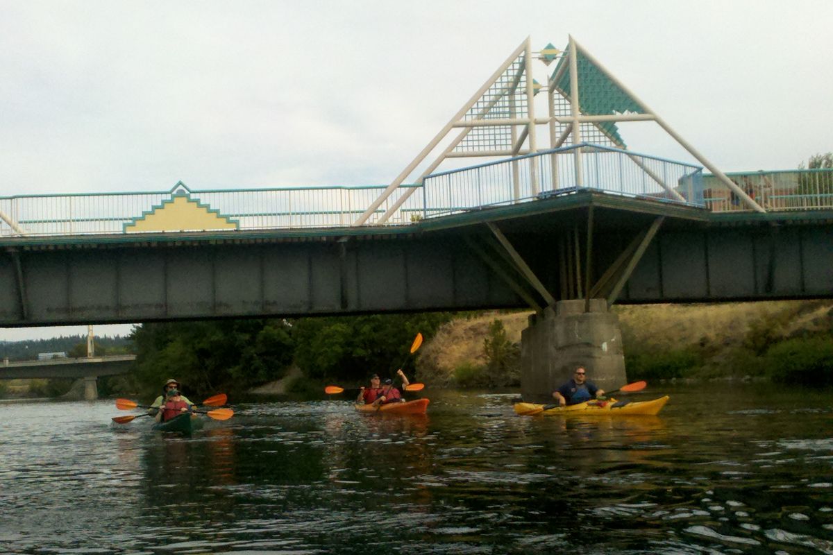 A group of kayakers float down the Spokane River, one of several hands-on presentations the Spokane River Forum has created to educate the community about the value of the river. Rather than present traditional lectures, the forum invites people to travel down stretches of the river. (Courtesy Spokane River Forum)