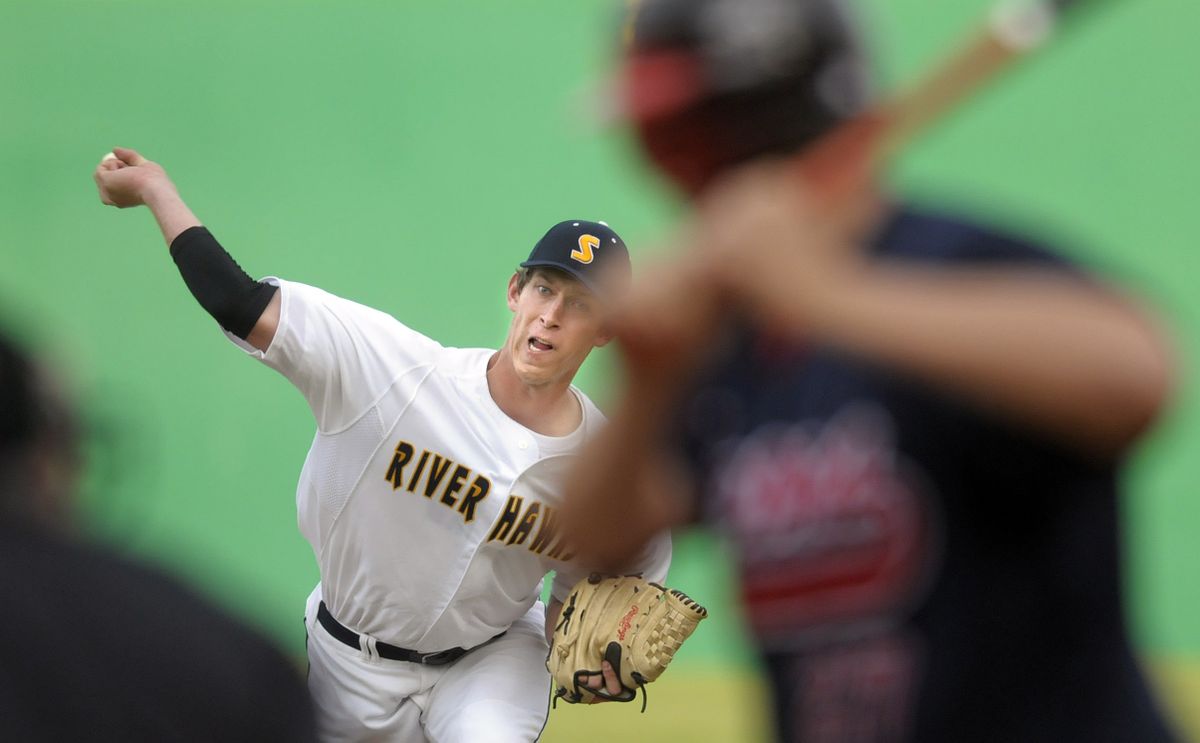 RiverHawks pitcher Andy Hunter fires a pitch against Kelowna in the second inning of Friday’s season opener at Avista Stadium. (CHRISTOPHER ANDERSON / The Spokesman-Review)