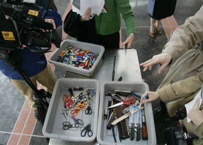 The Transportation Security Administration displays scissors, knives, cigarette lighters and other items that have been confiscated from U.S. airline passengers. Starting Dec. 22, passengers will be allowed to take small scissors and screwdrivers aboard planes again.
(Associated Press / The Spokesman-Review)
