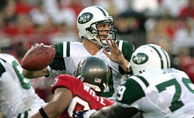 
Jets QB Chad Pennington throws under pressure in his first live action since his second major shoulder operation.  
 (Associated Press / The Spokesman-Review)