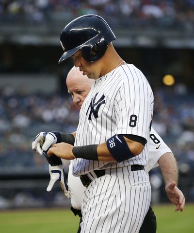 New York Yankees' Carlos Beltran is out of the starting lineup with a tight right hamstring. (Kathy Willens / Associated Press)