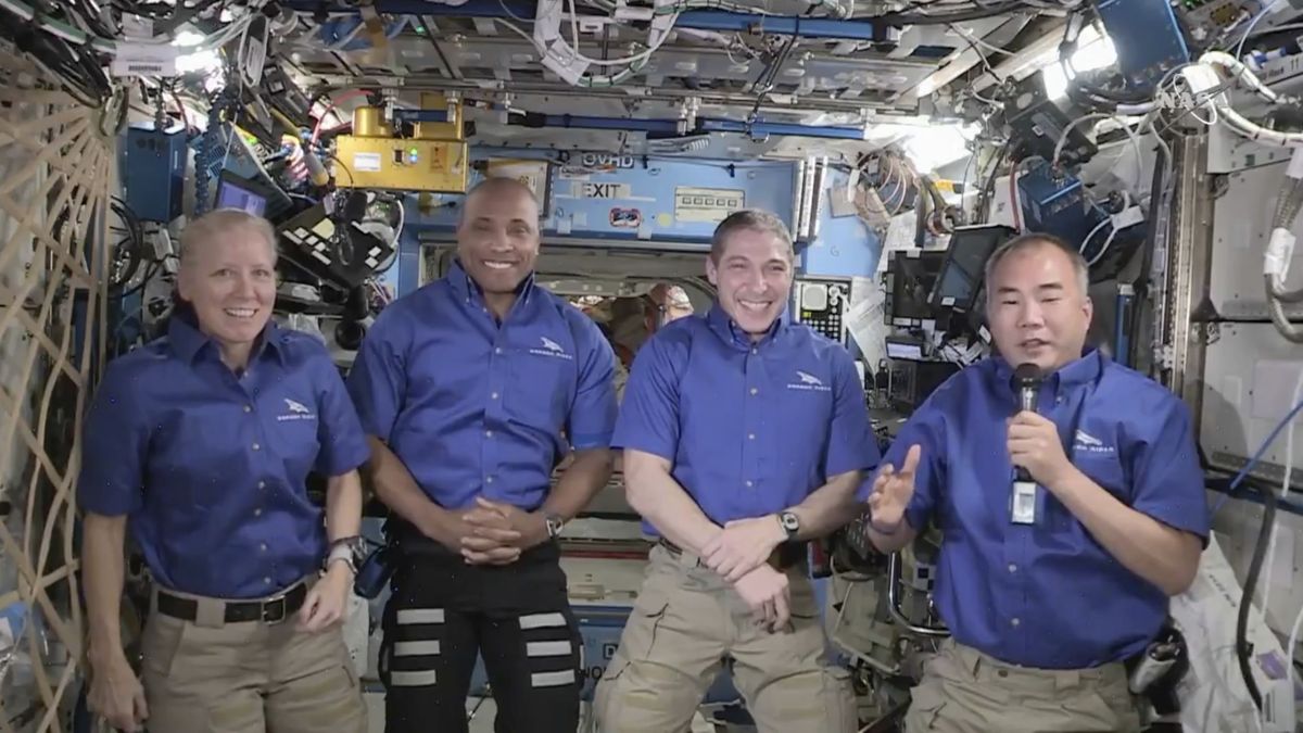 From left, NASA’s Shannon Walker, Victor Glover and Michael Hopkins, and Japan’s Soichi Noguchi hold a news conference aboard the International Space Station on Monday, April 26, 2021. They are winding up a six-month mission, after their replacements arrived Saturday on their own SpaceX capsule.  (HOGP)