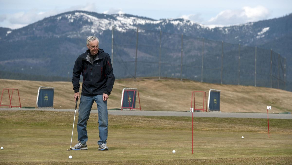 “I’m enjoying the weather and hitting some putts,” said Mike Henneberry of Spokane after scowling at a short putt at Prairie Falls Golf Club in Post Falls on Thursday. Because of February snow, this is a record-late start of the season, according to Prairie Falls owner Billy Bomar. (Kathy Plonka / The Spokesman-Review)