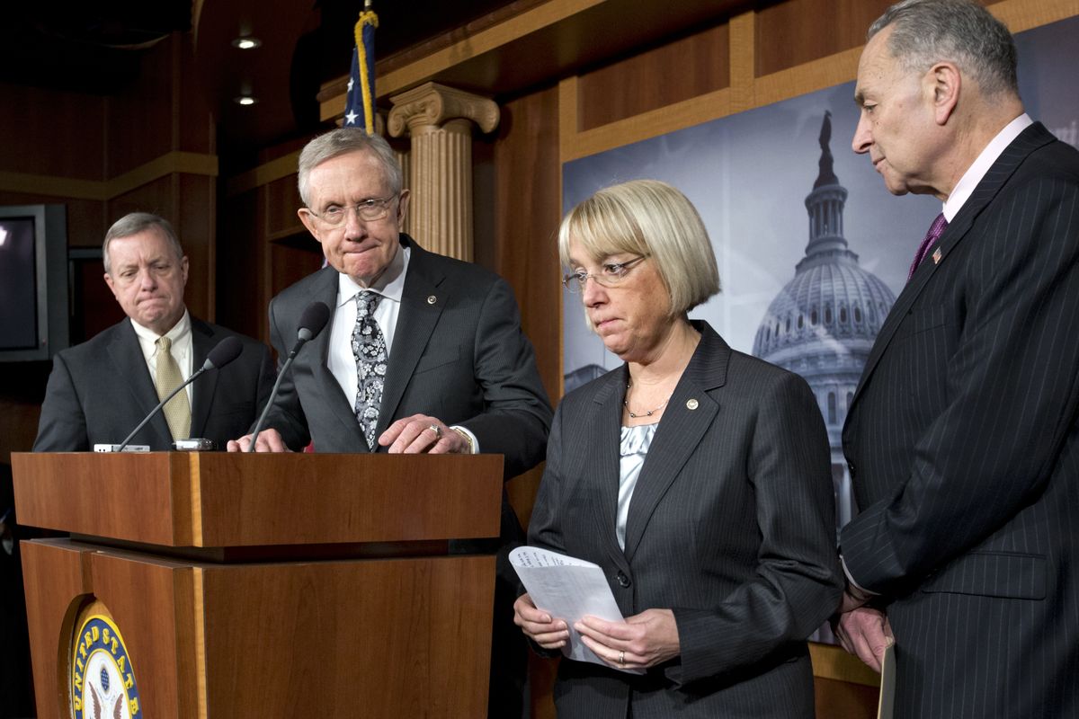 Senate Majority Leader Harry Reid of Nev., second from left, accompanied by fellow Senate Democratic leaders, pauses during a news conference on Capitol Hill in Washington, Thursday, Dec. 13, 2012, to discuss the stalled fiscal cliff negotiations and other unfinished business in the Senate. From left are, Senate Majority Whip Richard Durbin of Ill., Reid, Sen. Patty Murray, D-Wash., and Sen. Charles Schumer, D-N.Y. (J. Applewhite / Associated Press)