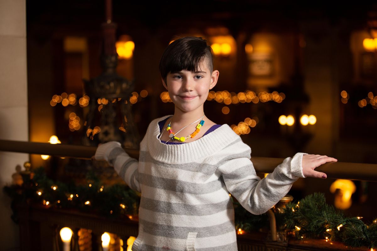 Gracie Coates poses for a portrait at the Historic Davenport Hotel on Nov. 21, 2018. Gracie Coates is the youth honoree for this year’s Inland Northwest Jingle bell Run on Dec.1, which benefits the Arthritis Foundation. (Libby Kamrowski / The Spokesman-Review)