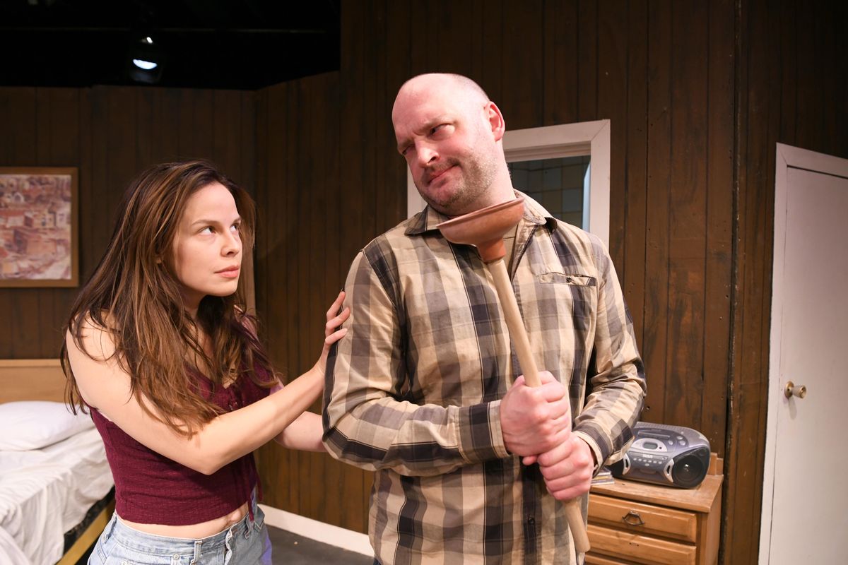 In the Spokane Civic Theatre production of “Bug,” actors Josephine Keefe and Danny Anderson play a lonely waitress and a paranoid war veteran stuck in a seedy motel. (Jesse Tinsley / The Spokesman-Review)