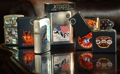 
Zippo lighters available for sale at a smoke shop in Cranberry, Pa., are arranged on a table. Pennsylvania-based Zippo Manufacturing Co. has filed a complaint with the U.S. International Trade Commission to try to stop seven companies, including four in China, from making and distributing lighters that look like Zippos. 
 (File Associated Press / The Spokesman-Review)