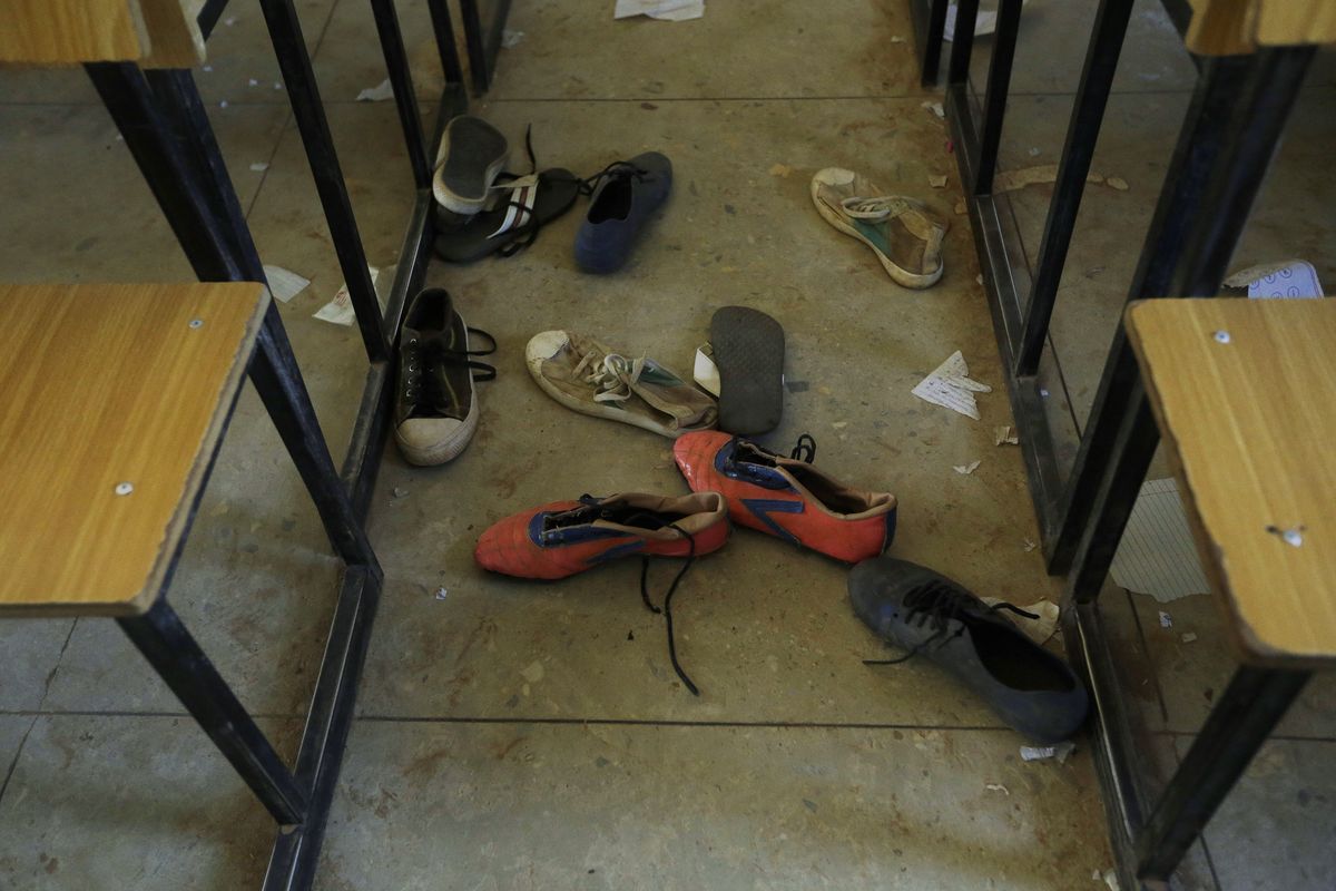 Shoes of the kidnapped students from Government Science Secondary School are seen inside their class room Kankara, Nigeria, Wednesday, Dec. 16, 2020. Rebels from the Boko Haram extremist group claimed responsibility Tuesday for abducting hundreds of boys from a school in Nigeria