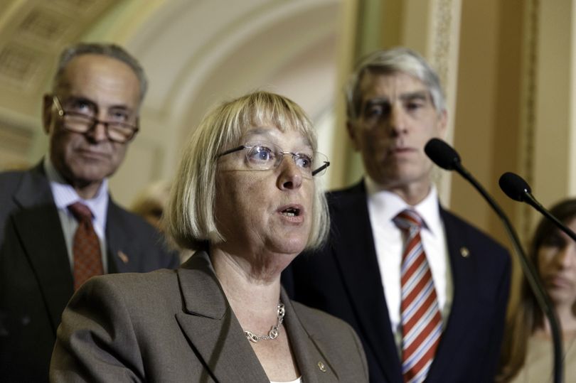 Sen. Patty Murray, D-Wash., flanked by Sen. Chuck Schumer, D-N.Y., left, and Sen. Mark Udall, D-Colo., speaks to reporters on Capitol Hill on Wednesday. (Associated Press)