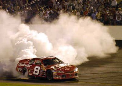 
Dale Earnhardt Jr., winner of the NASCAR Chevy American Revolution 400 race, does a burnout in front of the fans at Richmond International Raceway in Richmond, Va.Dale Earnhardt Jr., winner of the NASCAR Chevy American Revolution 400 race, does a burnout in front of the fans at Richmond International Raceway in Richmond, Va.
 (Associated PressAssociated Press / The Spokesman-Review)