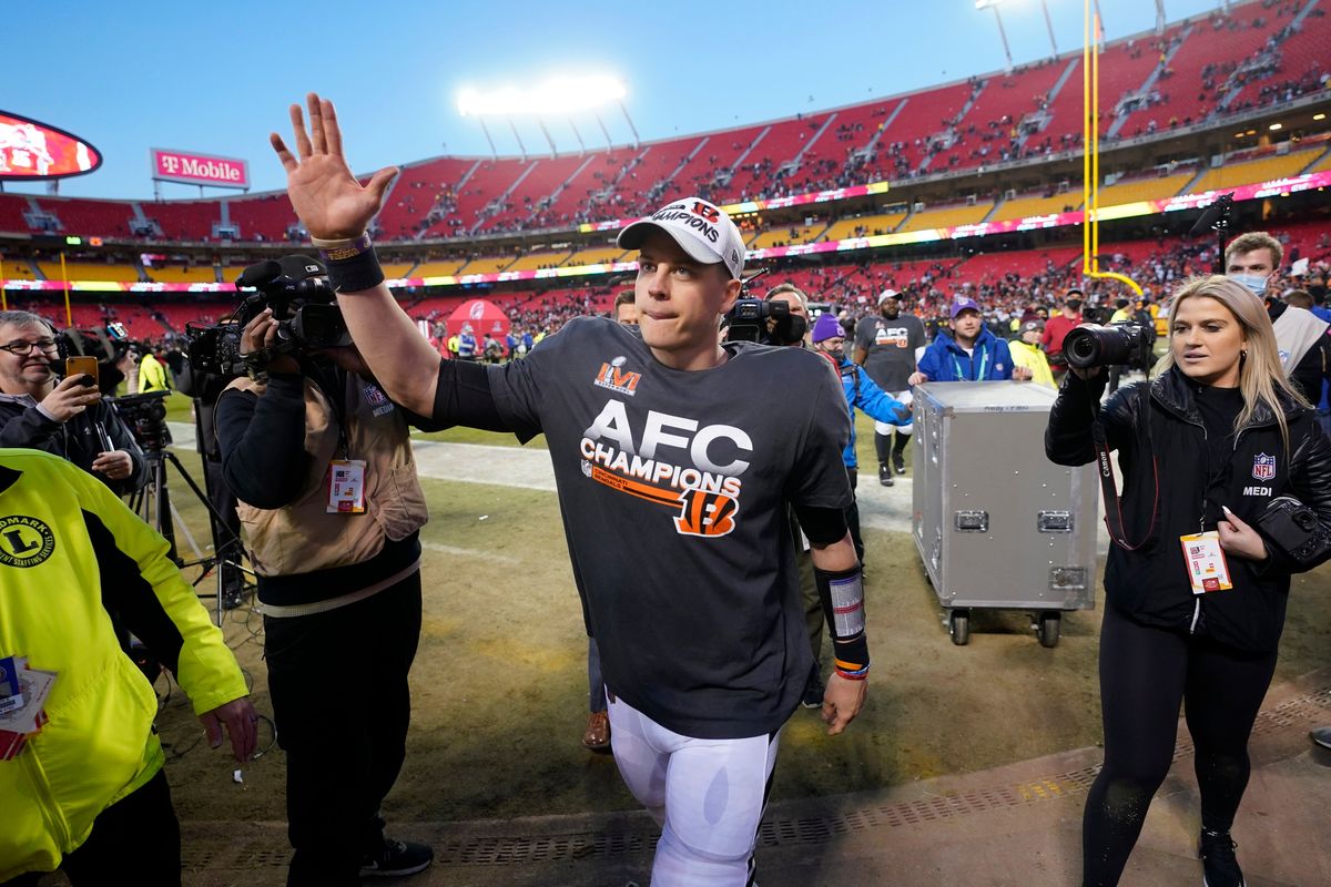 Cincinnati Bengals quarterback Joe Burrow waves to fans as he walks off the field after the AFC championship NFL football game against the Kansas City Chiefs, Sunday, Jan. 30, 2022, in Kansas City, Mo. The Bengals won 27-24 in overtime. (Paul Sancya)