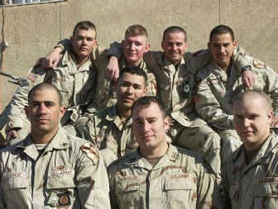 
Troops from the U.S. Army's 8th Cavalry Regiment in Baghdad pose during a scene from PBS' 