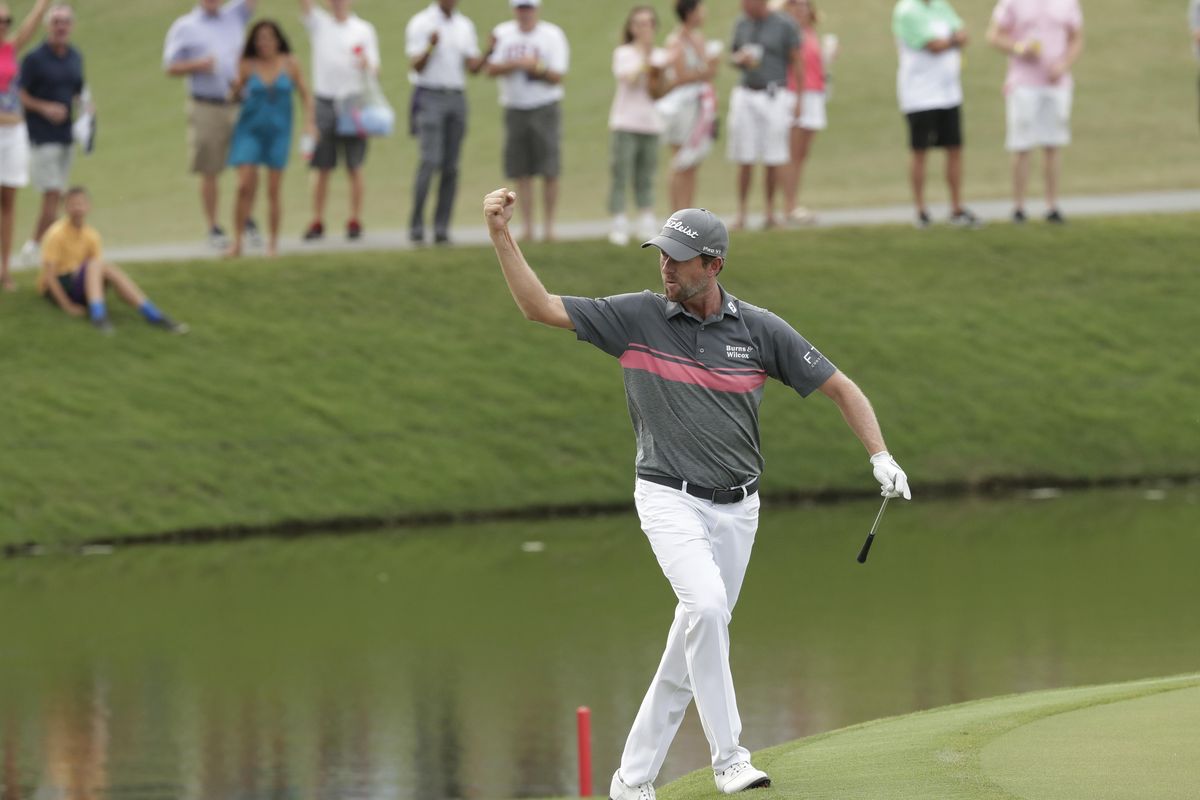 Webb Simpson celebrates an eagle shot on the 11th hole during the third round of The Players Championship golf tournament Saturday, May 12, 2018, in Ponte Vedra Beach, Fla. (John Raoux / Associated Press)