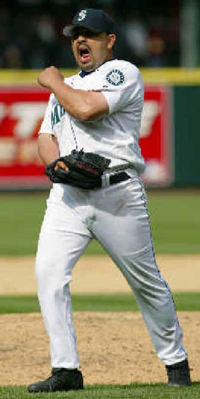 
Mariners closer Eddie Guardado is all pumped up about swinging a bat.
 (Associated Press / The Spokesman-Review)