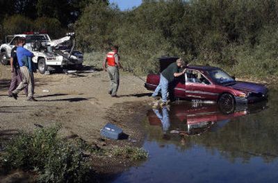 Empty car pulled from river | The Spokesman-Review