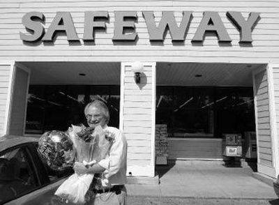 
A customer buys flowers at a Safeway store in Mountain View, Calif. Grocery store chain Safeway Inc. said Thursday its first-quarter profit jumped 22 percent.  
 (Associated Press / The Spokesman-Review)