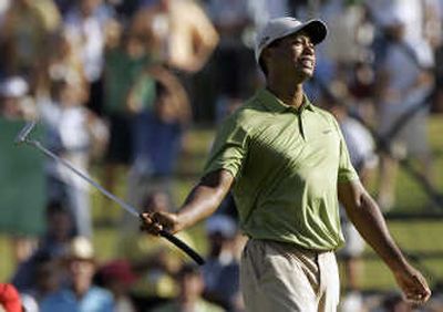 Associated Press Weary Tiger Woods will skip the opening event of the FedEx Cup.
(Associated Press / The Spokesman-Review)