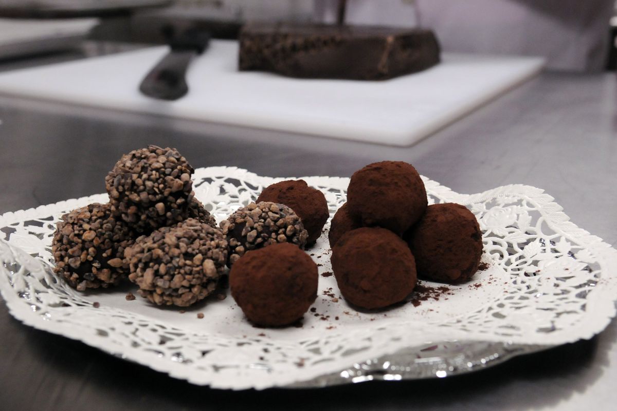 Julia Balassa-Myracle of Chocolate Myracles handcrafted these special truffles. On the left are dark chocolate truffles rolled in cocoa nibs, beside those are dark chocolate truffles rolled in cocoa powder. She uses Belgian Callebaut chocolate to make the truffles. (J. BART RAYNIAK)