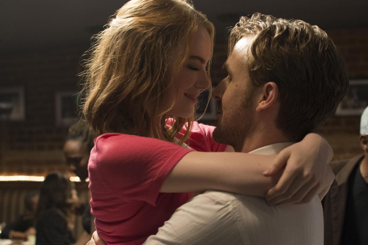 This image released by Lionsgate shows Ryan Gosling, right, and Emma Stone in a scene from, "La La Land." The film was nominated for a Golden Globe award for best motion picture musical or comedy on Monday, Dec. 12, 2016. The 74th Golden Globe Awards ceremony will be broadcast on Jan. 8, on NBC. (Dale Robinette/Lionsgate via AP) ORG XMIT: NYET116 (Dale Robinette / AP)