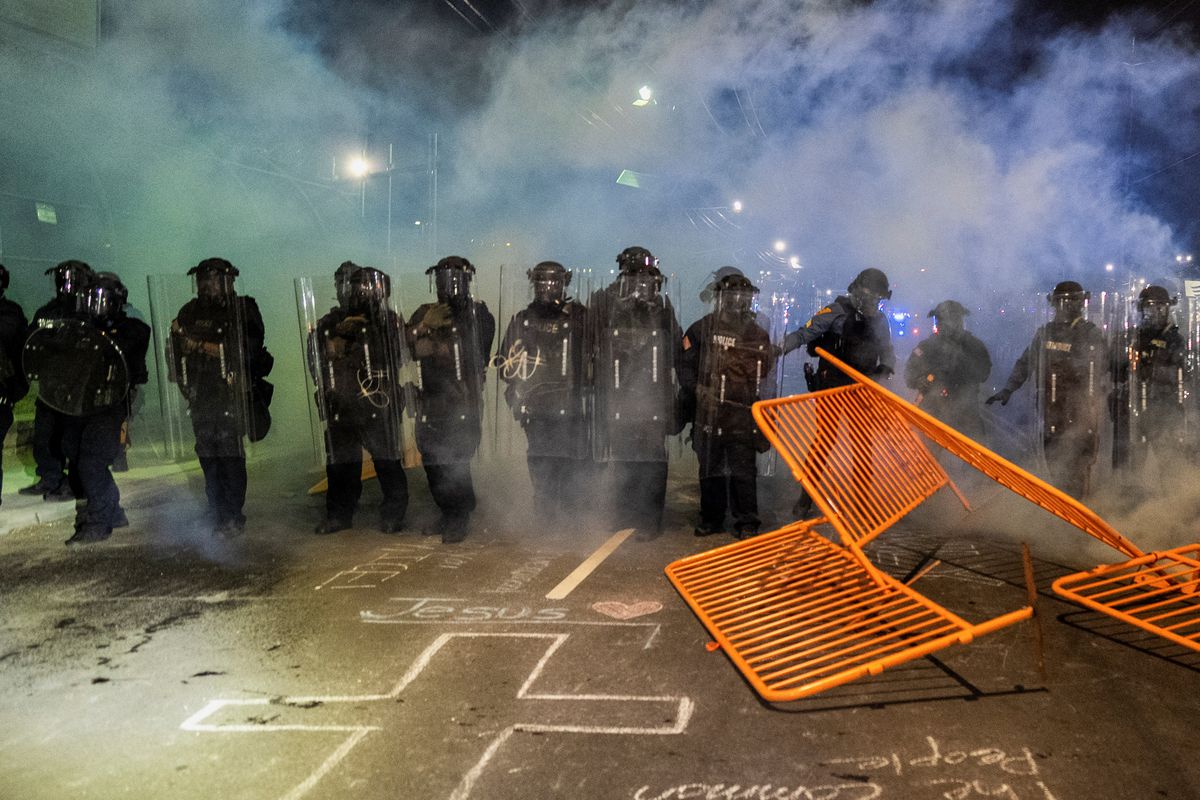 New Jersey State Policemen in riot gear operate amidst the deployed tear gas as protestors remain gathered outside Delaney Hall detention center, in Newark, New Jersey, U.S., May 29, 2026. (Reuters)