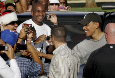 President-elect Barack Obama greets well-wishers after his workout at the Kaneohe Bay Marine Corps Base in Kailua, Hawaii, on Wednesday.  (Associated Press / The Spokesman-Review)